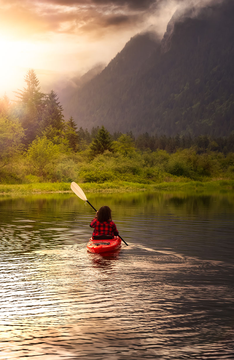 Kayak on a river, nature, peaceful and serene.